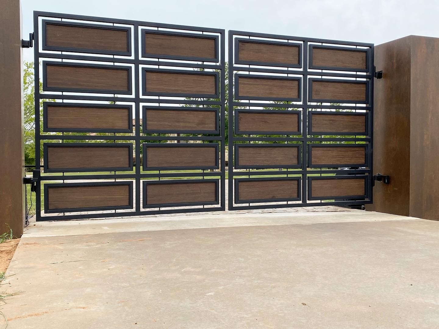modern wood and metal swing gate
